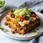 Easy cheesy low carb taco casserole – keto-friendly, loaded with seasoned beef, cheese, and veggies