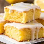 Easy lemon brownies – dense, fudgy, citrusy squares with a tangy lemon glaze
