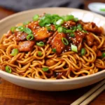 Easy sticky garlic chicken noodles – high protein, tender chicken, chewy noodles in a sweet-savory garlic sauce