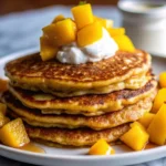 Easy mango pancakes – light, fluffy, studded with fresh mango chunks