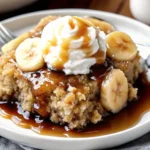 Easy bananas foster cobbler – warm, caramelized banana dessert with buttery biscuit topping