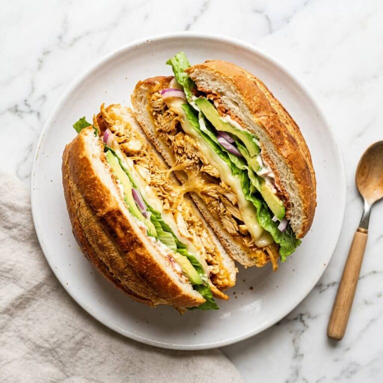 Chicken Torta Sandwich Recipe - Chicken Torta Sandwich Recipe served in a white bowl overhead view