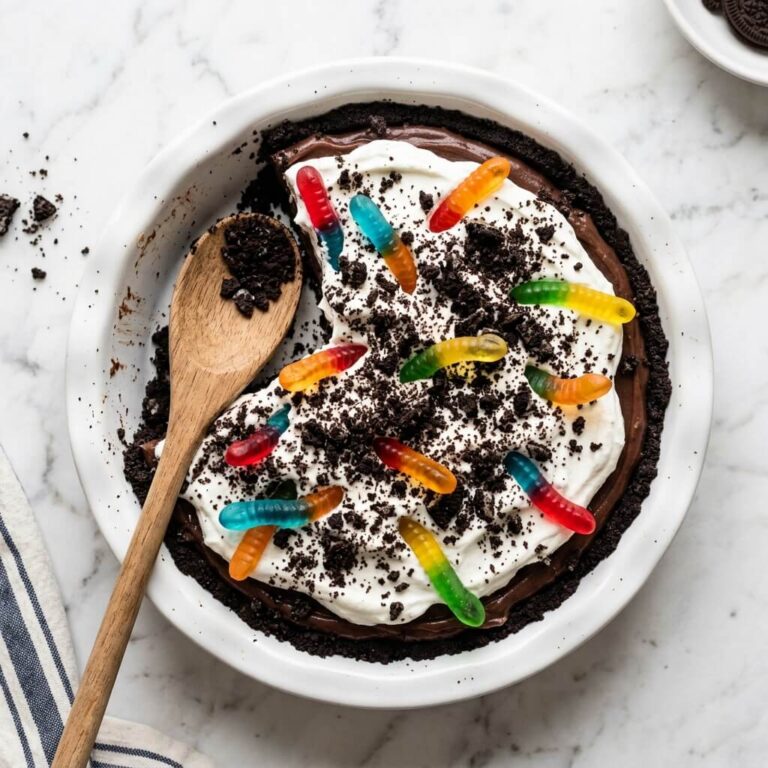Oreo Dirt Pie Recipe - Oreo Dirt Pie Recipe served in a white bowl overhead view